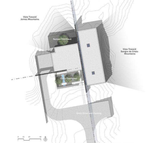 一層現(xiàn)代風格山間別墅，兩面混凝土墻壁打開整個建筑空間