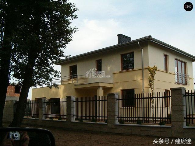 簡歐風格15米X10米兩層帶車庫磚混農(nóng)村二層房屋設計圖帶建成的圖片