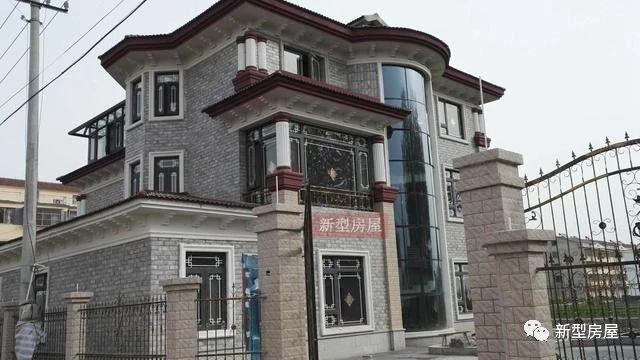 幾棟完工的農(nóng)村房屋實拍照片，一棟賽一棟的漂亮